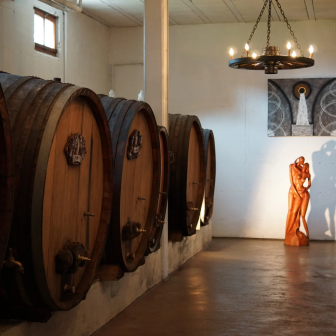 Wine cellar with oak barrels in an Alsace winery