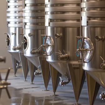 Stainless steel fermentation tanks in a Provence winery